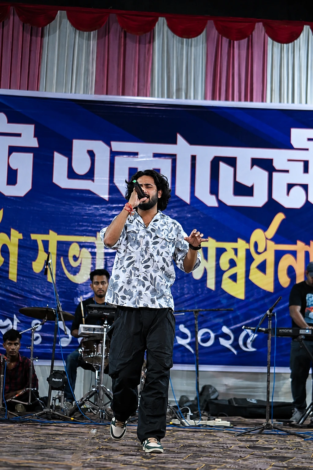 Students participating in a cultural function